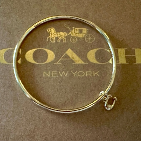 Coach Gold-tone Skinny Bangle Bracelet with Dainty Signature C Dangling Charm. - Picture 3 of 6